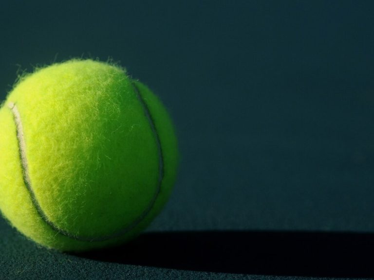 Tennis Ball On Court